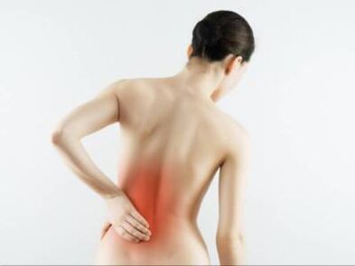 Back pain in the lower back of a woman